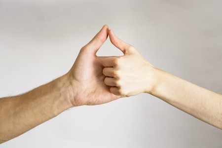 Handshake men and women on white backgroundの写真素材