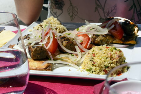 Lula kebab with rice and vegetables. food backgroundの写真素材