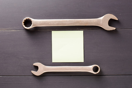 set of household tools on brown wooden surface. Tools background. Top view. Copy space.の写真素材
