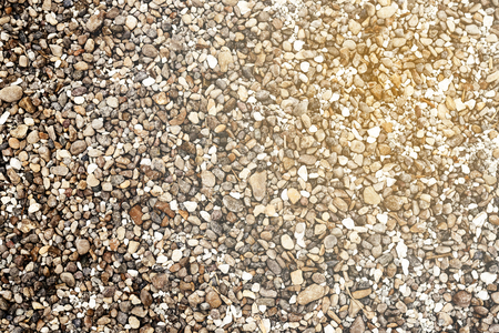 Abstract texture of white-gray gravel and crushed stone,filling and road constructionの写真素材