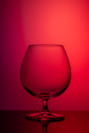 vertical image of glass on colored background. concept of minimalismの写真素材