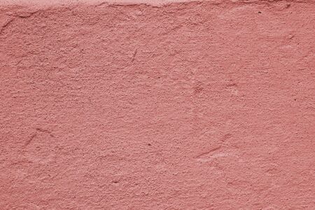 Texture of old pink-painted cement wall. creative layout