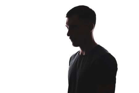 Silhouette portrait of caucasian man on the side. isolated on white backgroundの写真素材