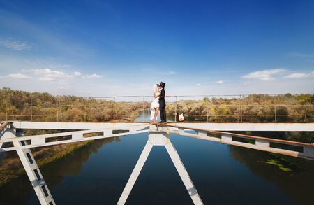 Bride and groom on the bridgeの写真素材