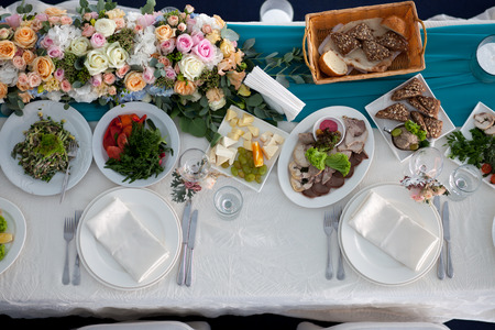 Table set and salad for a wedding reception top view
