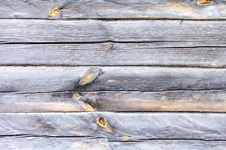 The wall of an antique wooden houseの写真素材