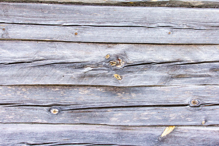 The wall of an old wooden houseの写真素材
