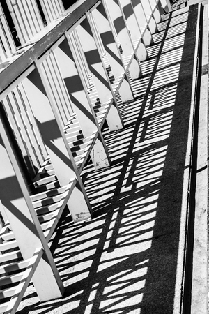 European Minsk, Nemiga-straight fence of the bridge in hard midday lightの写真素材