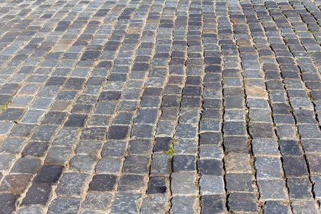 cobblestone old street. Once upon a time, swept carts, delivering on the affairs of their owners and people were running around fussily simpleの写真素材