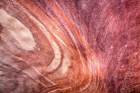 Red wall texture with water marks at Petra, Jordan.の写真素材