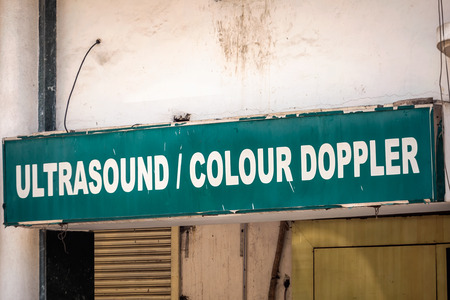Medical office sign with various departments at Udaipur, India.の写真素材