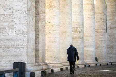 Old man walking in Vatican city, Rome, Italy.の写真素材
