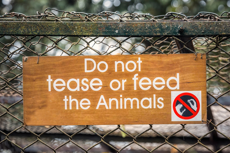 Zoo warning sign at zoo of Darjeeling, India.の写真素材