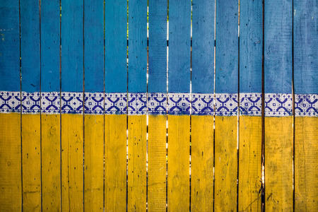 Fence colored like ukranian fence at Kiev, Ukraine.の写真素材