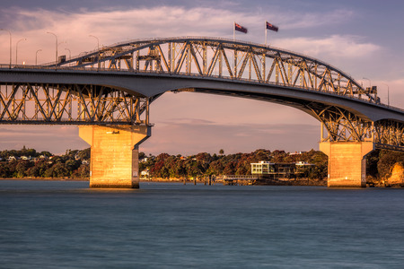 Auckland Harbour Bridge at sunset Auckland, New Zealand.の写真素材