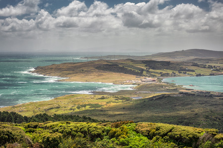 New Zealand coast with huge waves near Bluff, New Zealand.