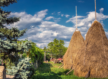 Famous Straw haystack shot at sunset time at Carpathian Mountains, Ukraine.の写真素材