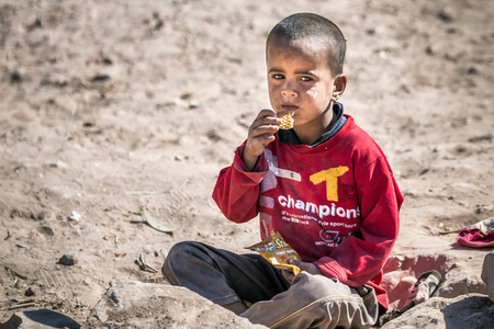 PETRA, JORDAN - OCTOBER 24, 2016: Portrait of local Bedouin child in Petra, Jordan.のeditorial素材