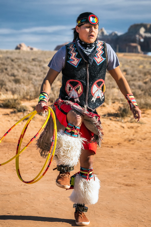 PAIGE, ARIZONA, USA - JANUARY 19, 2018: Navajo warrior performs raditional dance near Paige Arizona, USA.のeditorial素材