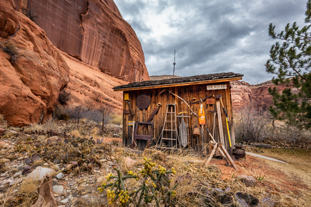 Moab, Utah, USA - January 20, 2018: Old tools and wooden house.のeditorial素材
