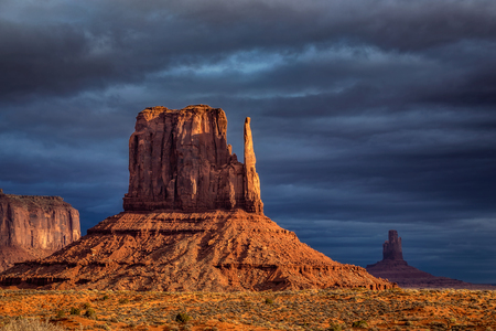 Amazing sunrise with pink, gold and magenta colors near Monument Valley, Arizona, USA.の写真素材