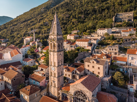 Kotor, Montenegro. Bay of Kotor bay is one of the most beautiful places on Adriatic Sea, it boasts the preserved Venetian fortress, old tiny villages, medieval towns and scenic mountains.の写真素材