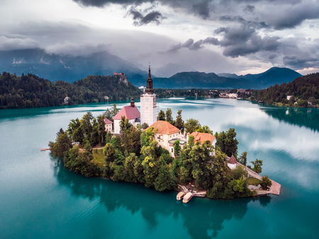 Amazing View On Bled Lake, Island,Church And Castle With Mountain Range (Stol, Vrtaca, Begunjscica) In The Background-Bled, Slovenia, Europeのeditorial素材