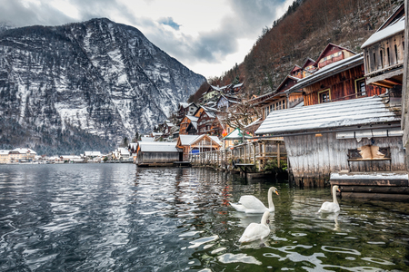 Scenic picture-postcard view of famous Hallstatt mountain village in the Austrian Alps at beautiful light in winter, Salzkammergut region, Hallstatt, Austria.の写真素材