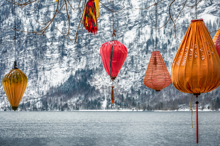 Scenic picture-postcard view of famous Hallstatt mountain village in the Austrian Alps at beautiful light in winter, Salzkammergut region, Hallstatt, Austria.の写真素材