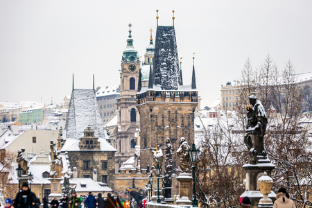 Charles bridge in winter morning at Prague Czech Republic. This bridge is the oldest in the city and a very popular tourist attraction.の写真素材