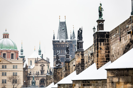 Charles bridge in winter morning at Prague Czech Republic. This bridge is the oldest in the city and a very popular tourist attraction.の写真素材