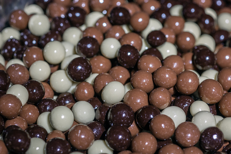 Great choice of colorful sweets and chocolate candy for sale in shop window at Prague, Czech...