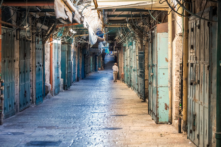Lonely tourist in old town of Jerusalem.の写真素材