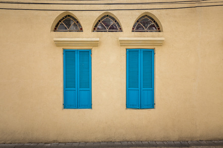 Old wooden windows in Tel Aviv, Israel.