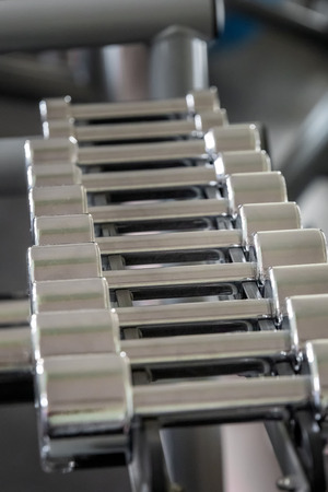 Rack of iron weights in a gym. Close up shot.の写真素材