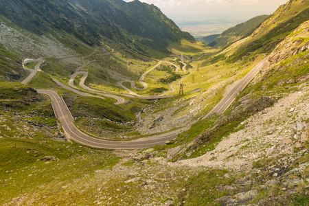 Top view of the famous winding road transfagaras in the picturesque mountainous areas on a sunny day in Romaniaの写真素材
