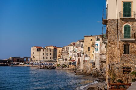 Attractive evening cityscape of Cefalu town. Amazing sunset on Mediterranean sea at Catania Sicily,...