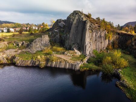 Drone view of the polygonal structures of basalt columns, also named Herrnhausfelsen, natural...