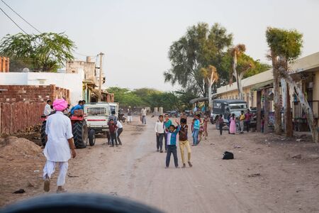 Jodhpur, India - March 08 2017: A large number of village children have fun on the street.のeditorial素材