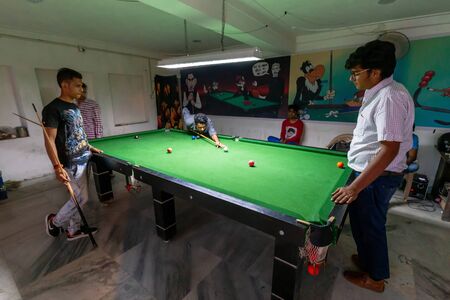 Udaipur, India - March 05 2017: Local man playing pool.