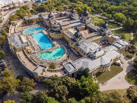 Aerial drone view of the famous Szechenyi Thermal Bath and Spa on a sunny autumn day in Budapest, Hungary. Budapest, Hungary - September 30 2019.のeditorial素材