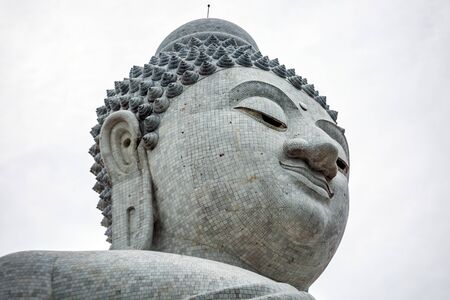 Head of Phuket Big Buddha statue. White Phuket big Buddha is the one of landmarks on Phuket island.