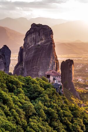Monastery Meteora Greece. Stunning summer panoramic landscape. View at mountains and green forest against epic blue sky  clouds.   list object.の写真素材