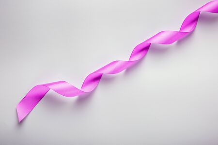 October is Breast Cancer Awareness Month. Pink Ribbon for supporting people living and illness. Healthcare, International Women day and World cancer day concept.の写真素材