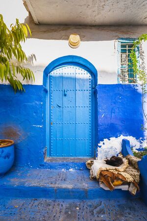 Colorful wooden doors at famous blue city of Chefchaouen, Morocco.の写真素材