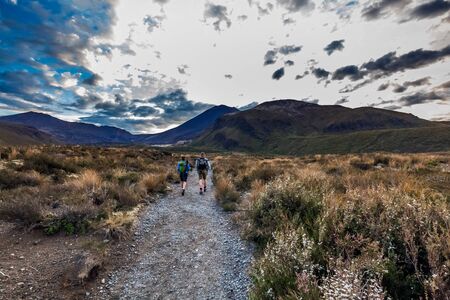 Hikers at Tongariro Crossing track, Tongariro National Park, New Zealandの写真素材