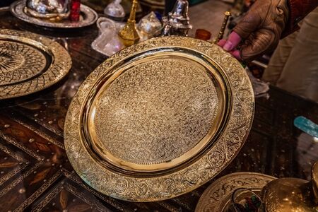 Moroccan handmade metal lamps and plates at the shop in Medina of Fez, Morocco.の写真素材