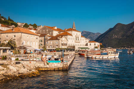 Fjord in Adriatic Sea.  Perast town shore of Boka Kotor bay (Boka Kotorska), Montenegro, Europe. Kotor Bay is a UNESCO World Heritage Site. Kotor, Montenegro - July 20 2018.のeditorial素材