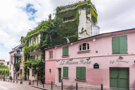 Charming cafe on Montmartre hill. Montmartre with traditional french cafes and art galleries is one of the most visited landmarks in Paris. Paris, France - July 28 2018.のeditorial素材
