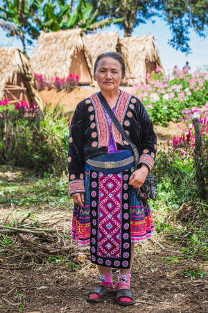 Tribal woman stands in the jungle wearing traditional clothes. Chiang Mai, Thailand - November 11 2017.のeditorial素材